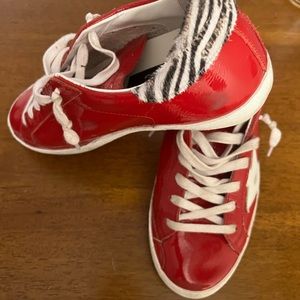 Golden Goose red patent superstars, zebra back.